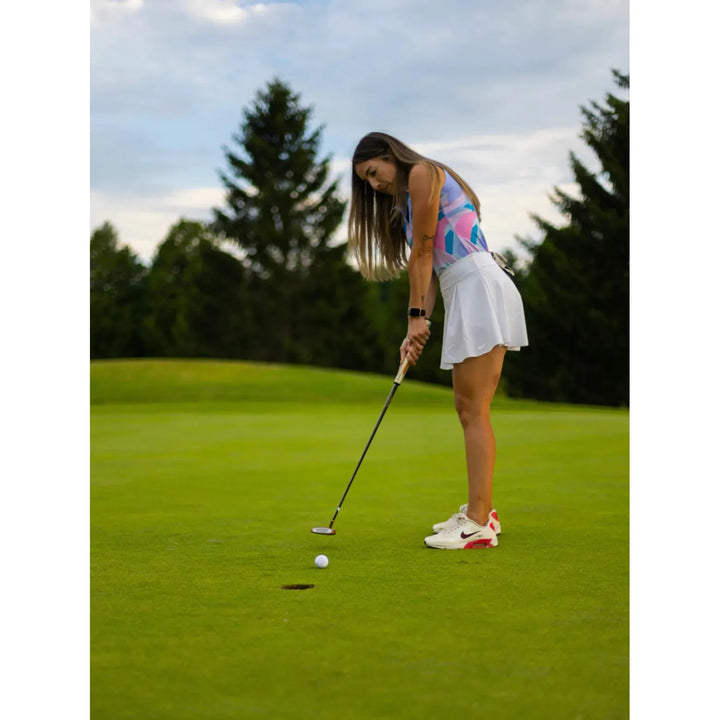 polo de golf femme sans manches full wedge fore porté